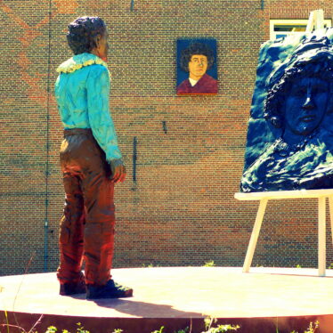 Der junge Rembrandt in Arbeit vis a vis seines Geburtshauses in Leiden (NL)